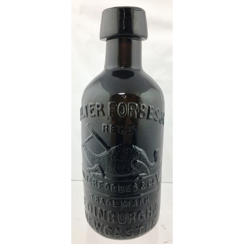 187 - RILEYS PATENT
BOTTLE. 7ins tall.
Very dark amber,
almost black glass
ginger beer, heavily
embossed W... 