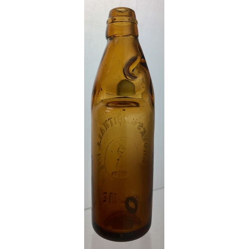 189 - HULME GROVES
& WHITNALL CODD
BOTTLE. 9ins tall.
Burnt orange/ amber
glass, heavily embossed
GROVES &... 