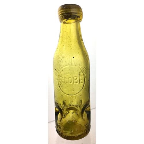 190 - SALFORD SYKES
MACVAY PATENT
CODD BOTTLE. 7.25ins
tall. Light amber glass,
6 retaining lugs to base,
... 