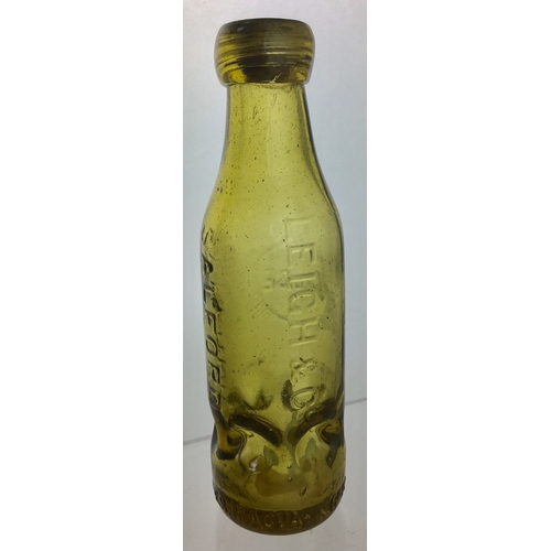 190 - SALFORD SYKES
MACVAY PATENT
CODD BOTTLE. 7.25ins
tall. Light amber glass,
6 retaining lugs to base,
... 