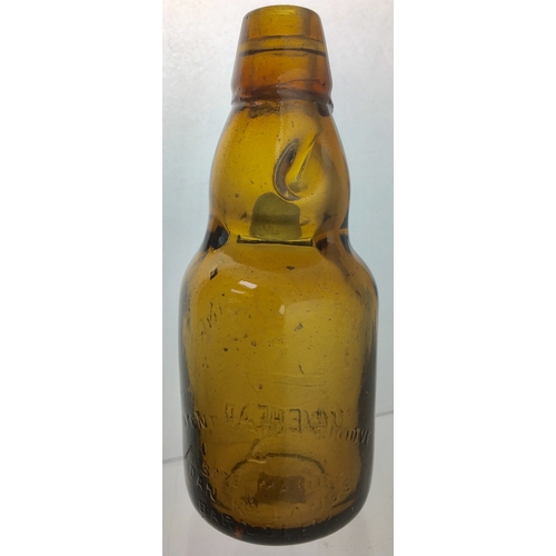 192 - MINEHEAD
DUMPY CODD
BOTTLE. 7.5ins tall.
Dark amber glass,
2 neck retaining
lugs, embossed
JOHN BATT... 