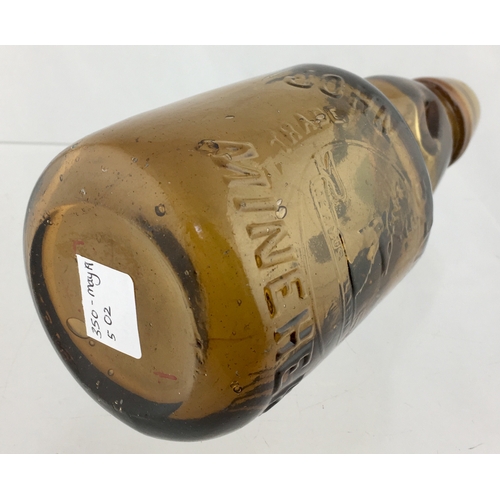 192 - MINEHEAD
DUMPY CODD
BOTTLE. 7.5ins tall.
Dark amber glass,
2 neck retaining
lugs, embossed
JOHN BATT... 