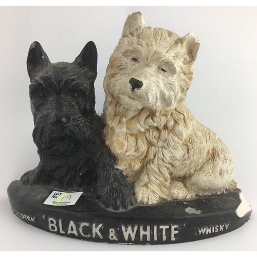 19 - BLACK & WHITE SCOTCH WHISKY FIGURE. 7.5ins, porcelain, chipped in several places.