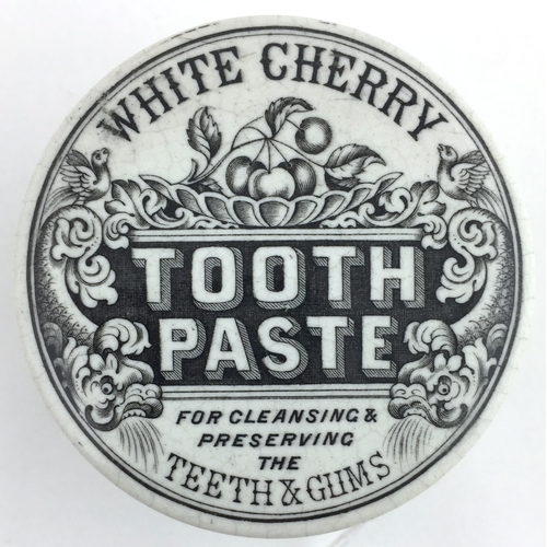 104 - WHITE CHERRY TOOTH PASTE POT LID & BASE. 2.75ins diam, black & white transfer, oriental animal pict ... 