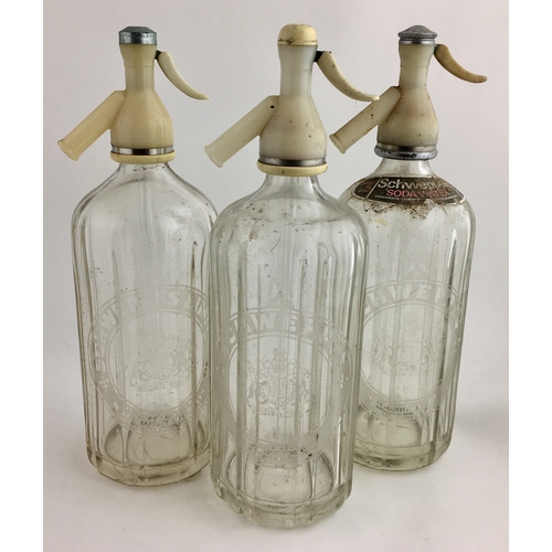 494 - SCHWEPPES SODA SYPHON TRIO. 11.75ins straight sided  syphons with vertical ribbing, acid etched SCHW... 