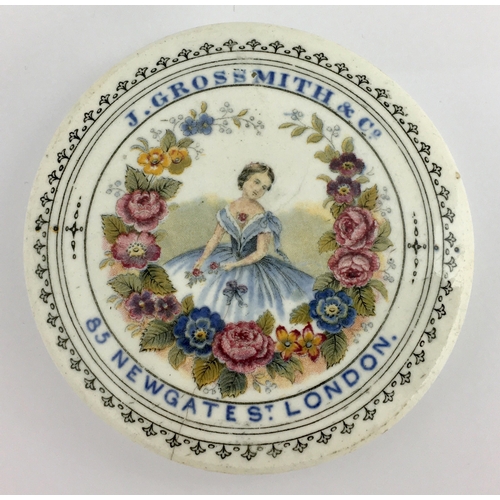 500 - LONDON GROSSMITH & CO POT LID. (APL pg 307, 91a) 3.25ins diam. Multicoloured lid with a pictorial of... 