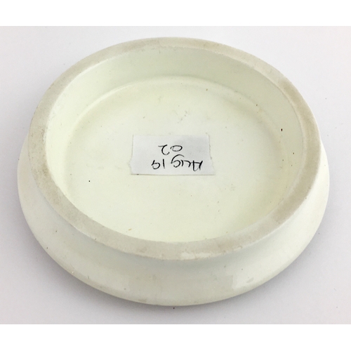 504 - LONDON CONNAUGHT TOOTH PASTE POT LID. (APL pg 362, 13) 3.25ins diam. Pale yellow & black transfer CO... 