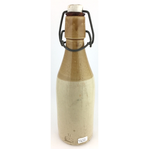 522 - CARLISLE GINGER BEER BOTTLE. 9ins tall to top of original swing stopper. T.t, ch, black transfer W. ... 