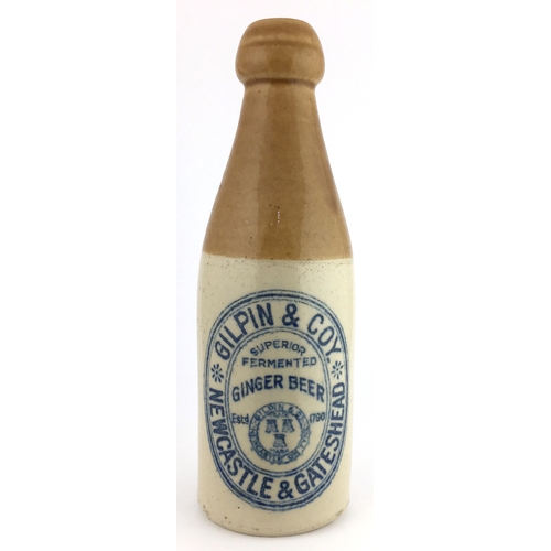 528 - NEWCASTLE & GATESHEAD GINGER BEER BOTTLE. 8ins tall. T.t, ch, blue transfer as previous lot  - GILPI... 