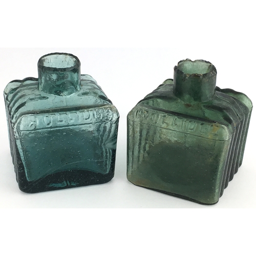 543 - HOLLIDGE SQUARE INK DUO. 2ins tall. Two colour variations, one turquoise blue other green glass. Rai... 