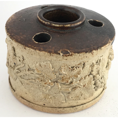 547 - SALT GLAZE INKWELL. 2.25ins diam. Light tan lower, top dark brown glaze, 3 qill holes & central fill... 