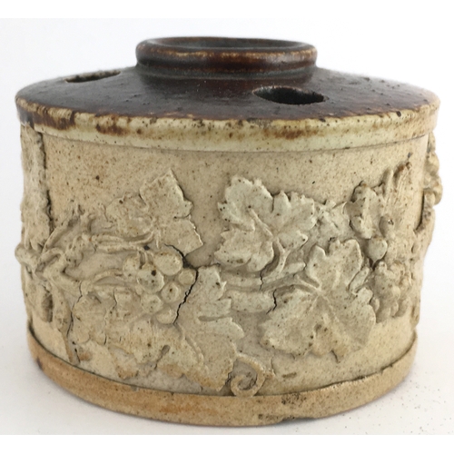 547 - SALT GLAZE INKWELL. 2.25ins diam. Light tan lower, top dark brown glaze, 3 qill holes & central fill... 