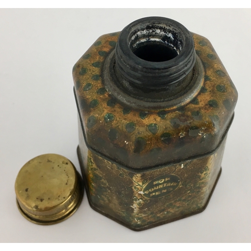 548 - SIGNET INKWELL. 3ins tall. Tapering 8 sided facetted tin, removable top section - glass ink inside -... 