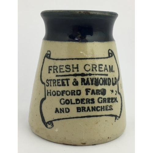 549 - GOLDERS GREEN CREAM POT. 2.9ins tall. Very strong deep blue top, churn shape, lower half off white. ... 