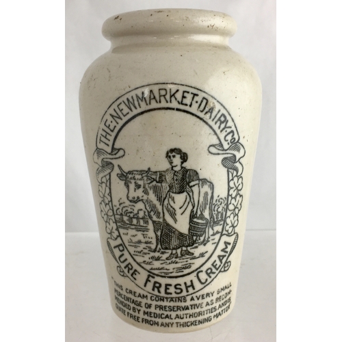 557 - THE NEWMARKET DAIRY CREAM POT. 4.75ins tall. Off white glaze, black transfer THE NEWMARKET DAIRY CO/... 