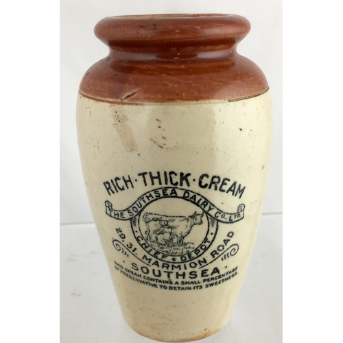 559 - SOUTHSEA CREAM POT. 5ins tall. Brown top, lower off white glaze, black transfer RICH THICK CREAM/ TH... 