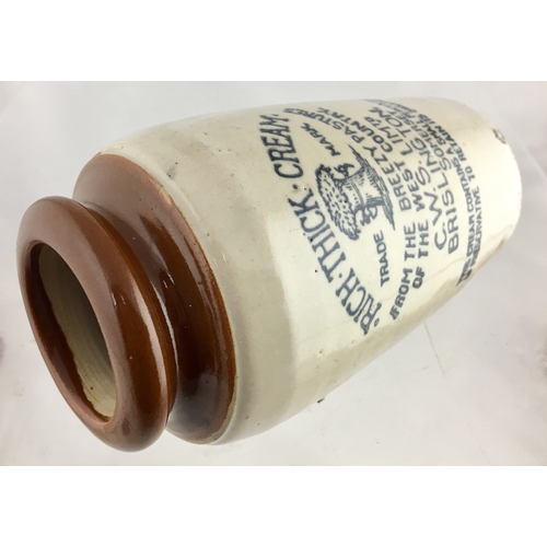 561 - SOMERSET CREAM POT. 5.25ins tall. Brown top, lower off white glaze, black transfer RICH THICK CREAM/... 