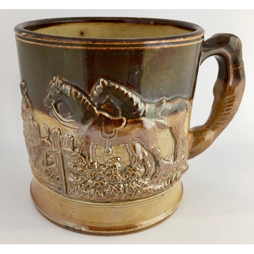 565 - BRAMPTON TANKARD. Two pint tankard, greyhound handle. T.t, shiny brown glaze. Raised sprig detail ‘T... 