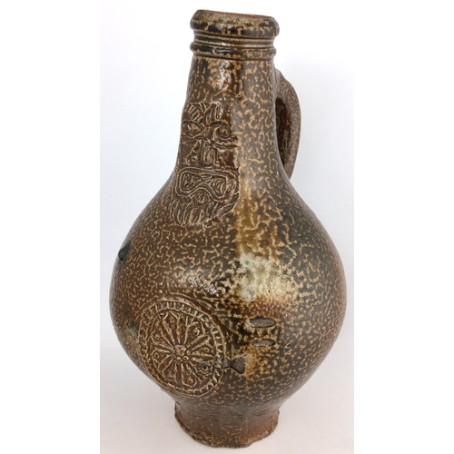 574 - BELLARMINE JUG. 9ins tall. Wonderful really hugely variating brown tiger effect salt glaze, bulbous ... 