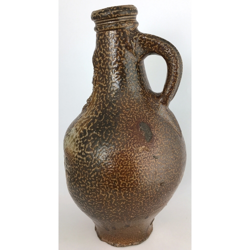 574 - BELLARMINE JUG. 9ins tall. Wonderful really hugely variating brown tiger effect salt glaze, bulbous ... 