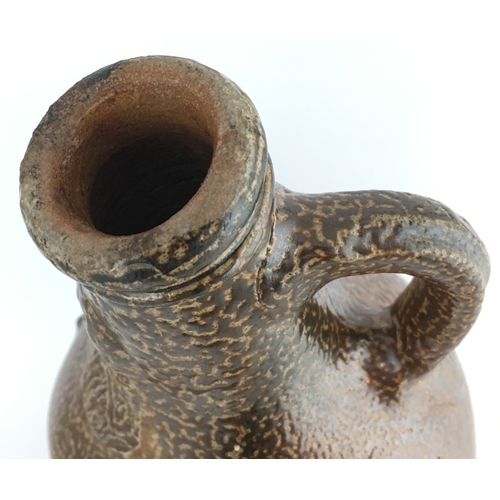 574 - BELLARMINE JUG. 9ins tall. Wonderful really hugely variating brown tiger effect salt glaze, bulbous ... 