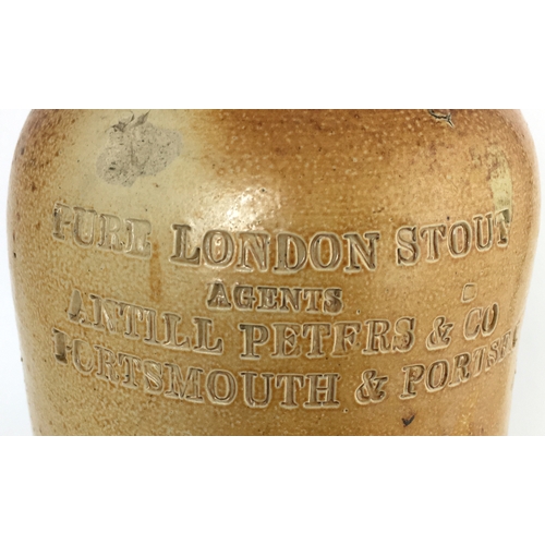 577 - PORTSMOUTH & PORTSEA SALT GLAZE STOUT BOTTLE. 8ins tall. Variating light tan salt glaze, cylindrical... 