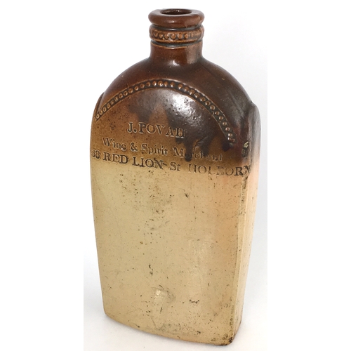 578 - HOLBORN SPIRIT FLASK. 7.25ins tall. T.t, variating browns salt glaze, flattened rectangular flask, r... 