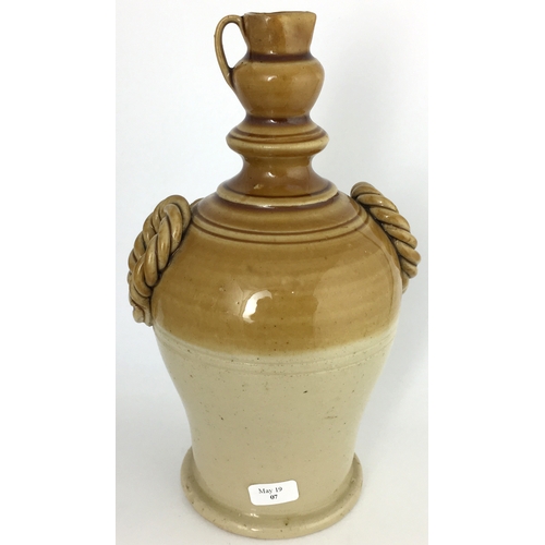 586 - WEST COUNTRY DATED 1890 STONEWARE MONEY BOX. 7ins tall., t..t tan, barley twist handle detail either... 