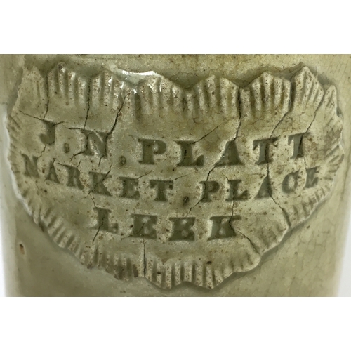 593 - LEEK SLAB SEAL PORTER. 8.75ins tall. Grey/ green slip glaze, some crazing. Front slab J. N. PLATT/ M... 