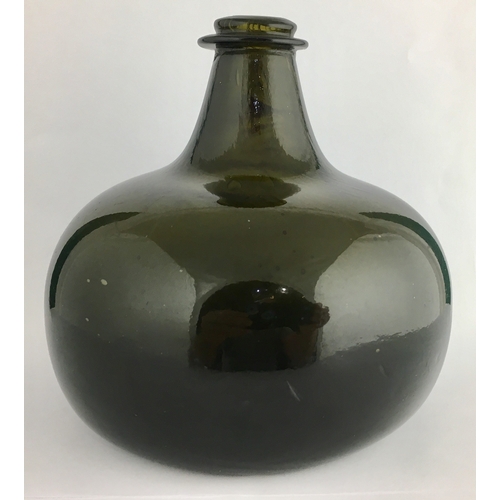 596 - TRANSITIONAL ENGLISH SHAFT & GLOBE WINE BOTTLE. 5.5ins tall, deep black/ very dark green glass, c. 1... 