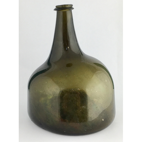 598 - ENGLISH MALLET BOTTLE. 7.25ins tall. Dark green glass, c. 1720-1730, very thin edged string lip (one... 