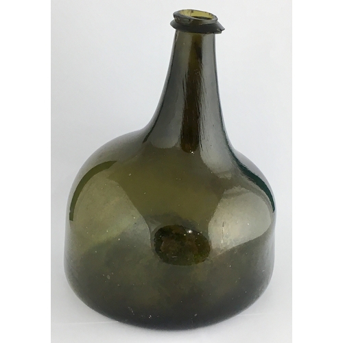 598 - ENGLISH MALLET BOTTLE. 7.25ins tall. Dark green glass, c. 1720-1730, very thin edged string lip (one... 