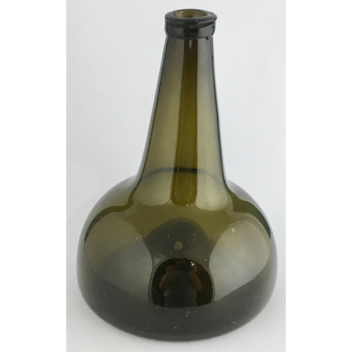 605 - DUTCH ONION WINE BOTTLE. 8.1ins tall, dark green/ black glass, applied string rim below tooled lip, ... 