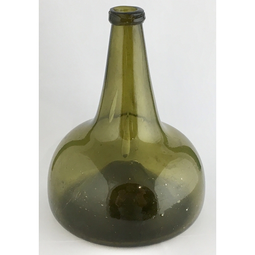 606 - DUTCH ONION WINE BOTTLE. 7.4ins tall, dark green glass, much paler than previous lot, applied string... 