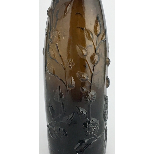 609 - ROSES LIME JUICE BOTTLE. 12ins tall, elegant long necked champagne shape, black/ dark brown glass. H... 