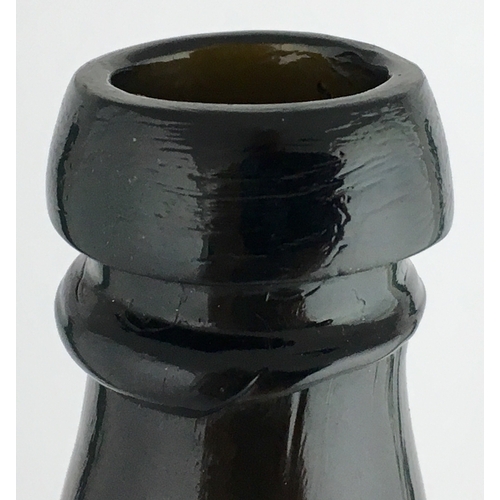 611 - BLACK HORSE BEER. 11.3ins tall, deep black/ brown glass, heavy double gloppy lip, cork closure. Eleg... 