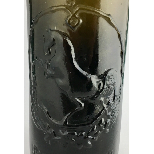 611 - BLACK HORSE BEER. 11.3ins tall, deep black/ brown glass, heavy double gloppy lip, cork closure. Eleg... 