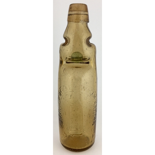 629 - SOUTH HANTS CODD BOTTLE. 9ins tall. Smokey light amber almost peachy coloured glass, 10oz codd, two ... 