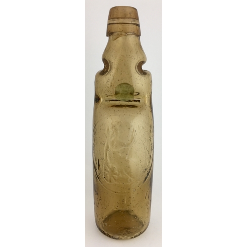 629 - SOUTH HANTS CODD BOTTLE. 9ins tall. Smokey light amber almost peachy coloured glass, 10oz codd, two ... 