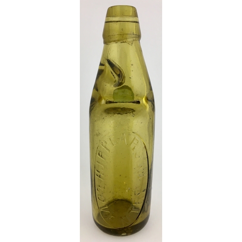 631 - COVENTRY CODD BOTTLE. 9ins tall. Light amber glass, 10oz codd, aqua marble, two neck retaining lugs.... 