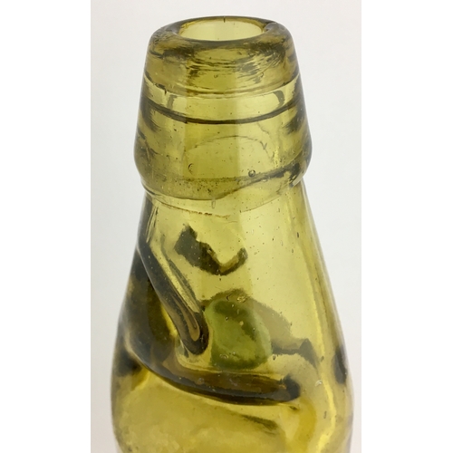 631 - COVENTRY CODD BOTTLE. 9ins tall. Light amber glass, 10oz codd, aqua marble, two neck retaining lugs.... 