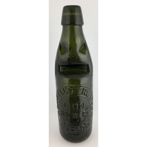 632 - OXFORD POWELL BRISTOL CODD BOTTLE. 9ins tall. Very dark green glass, 10oz codd, 4 neck retaining lug... 