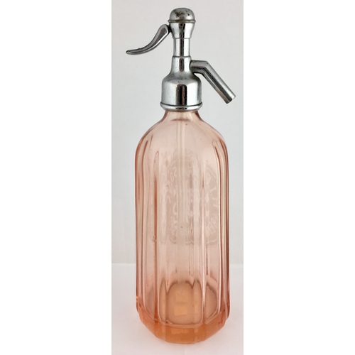 642 - BERKHAMSTED SODA SYPHON. 12ins tall to top of impressed trigger. Salmon pink coloured glass, vertica... 