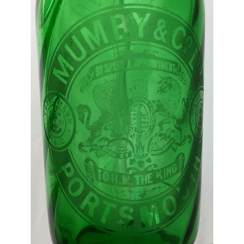 643 - PORTSMOUTH SODA SYPHON. 11.5ins tall to top of impressed trigger. Bright green glass, curved lines t... 