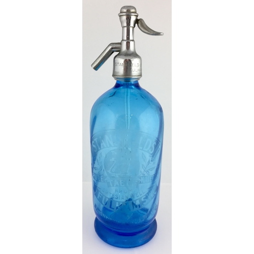 644 - FULHAM SODA SYPHON. 12 ins tall to top of impressed trigger. Pale blue glass, curve lines to body fi... 