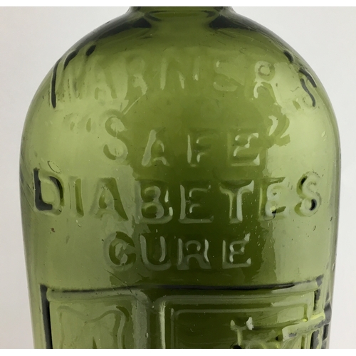 656 - WARNERS SAFE DIABETES CURE BOTTLE. 9.5ins tall. One pint, green glass, sloping shoulders, short neck... 