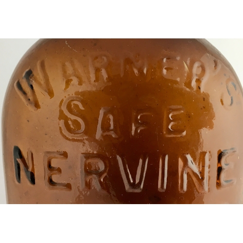 661 - WARNERS SAFE NERVINE BOTTLE. 9.5ins tall. One pint, dark amber glass, sloping shoulder, long neck, q... 