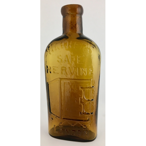 663 - WARNERS SAFE NERVINE BOTTLE. 7.25ins tall. Half pint, amber glass, sloping shoulders, with quite unu... 