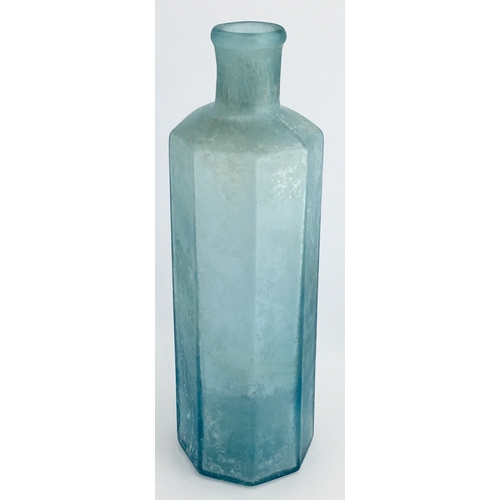 668 - OCTAGONAL PHARMACY MEASURE BOTTLE. 6.25ins tall. Octagonal shape, ice blue glass, embossed with Roma... 