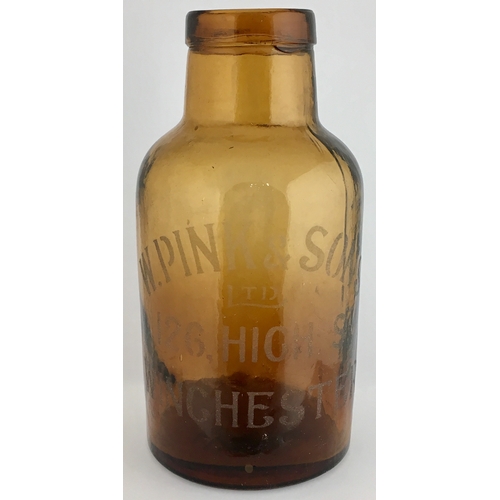 670 - WINCHESTER PHARMACY JAR. 8.25ins tall. Amber glass, cylindrical shape, rounded shoulders, wide neck ... 